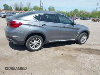 2016 BMW X6 xDrive35i with VIN 5UXKU2C53G0N84273, listed as a IAAI auction lot 42104112 with 61,183 mi miles and . Bid and sale history available at DreamBid. Image 4.