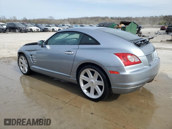 2004 Chrysler Crossfire z VIN 1C3AN69L14X024234, wystawiony jako Copart lot #51322415 z przebiegiem 70 243 mil mil oraz Szkoda całkowita • Salvage title. Historia ofert i sprzedaży dostępna na DreamBid. Obrazek 2.