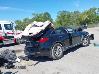 2014 Infiniti QX70 с VIN JN8CS1MU7EM451585, выставлен на аукционе IAAI как лот 41861091 с пробегом Не указан миль и . История ставок и продаж доступна на DreamBid. Изображение 4.