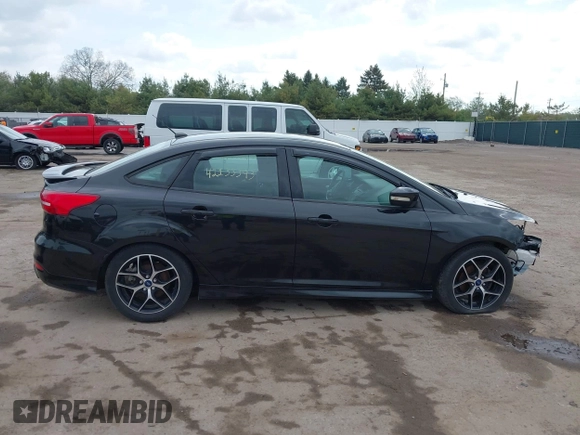 2015 Ford Focus SE with VIN 1FADP3F27FL386775, listed as a IAAI auction lot 42133393 with 102,960 mi miles and . Bid and sale history available at DreamBid. Image 14.