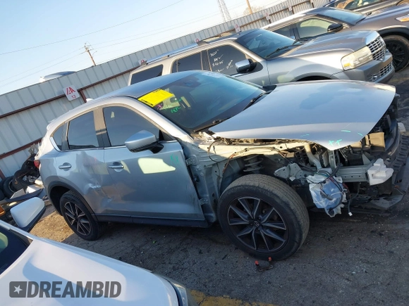 2018 Mazda CX-5 Touring with VIN JM3KFBCM6J0363767, listed as a IAAI auction lot 41776614 with 139,507 mi miles. Bid and sale history available at carsss.com. Image 13.