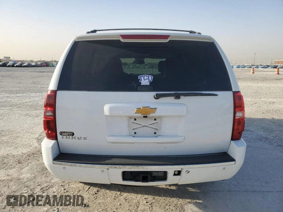 2013 Chevrolet Tahoe LTZ with VIN 1GNSCCE08DR102648, listed as a Copart auction lot 49677345 with 226,528 mi miles and Salvage title. Bid and sale history available at DreamBid. Image 6.