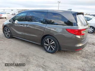 2020 Honda Odyssey Elite with VIN 5FNRL6H91LB030294, listed as a IAAI auction lot 41608291 with 74,477 mi miles and . Bid and sale history available at DreamBid. Image 3.