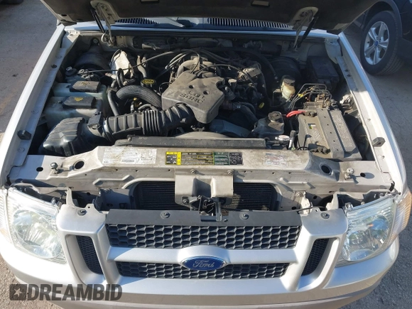 2003 Ford Explorer Sport Trac XLS z VIN 1FMZU67EX3UB19974, wystawiony jako IAAI lot #42563671 z przebiegiem 133 452 mil mil oraz . Historia ofert i sprzedaży dostępna na DreamBid. Obrazek 10.