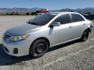 2013 Toyota Corolla L with VIN 5YFBU4EEXDP167695, listed as a Copart auction lot 52051685 with 192,427 mi miles and Salvage Title. Bid and sale history available at carsss.com. Image 1.