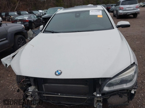 2014 BMW 7 Series ALPINA B7 with VIN WBAYE8C55ED134980, listed as a IAAI auction lot 41239686 with 145,435 mi miles. Bid and sale history available at carsss.com. Image 13.
