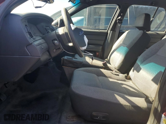 2009 Ford Police Interceptor with VIN 2FAHP71V59X129891, listed as a Copart auction lot 56601354 with Not provided miles and Salvage title. Bid and sale history available at DreamBid. Image 7.