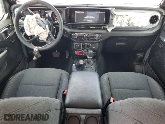 2024 Jeep Wrangler Sport S with VIN 1C4PJXDG3RW229567, listed as a Copart auction lot 55307335 with 7,797 mi miles and Salvage Title. Bid and sale history available at DreamBid. Image 8.