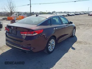 2017 Kia Optima LX with VIN 5XXGT4L33HG129749, listed as a IAAI auction lot 40360996 with 174,803 mi miles. Bid and sale history available at carsss.com. Image 4.