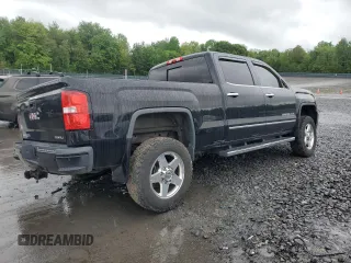 2015 GMC Sierra 2500HD Denali z VIN 1GT120E82FF100619, wystawiony jako Copart lot #58014705 z przebiegiem 188 525 mil mil oraz Szkoda całkowita • Salvage title. Historia ofert i sprzedaży dostępna na DreamBid. Obrazek 3.