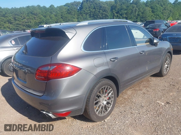 2012 Porsche Cayenne Turbo z VIN WP1AC2A29CLA81105, wystawiony jako IAAI lot #42618593 z przebiegiem 173 873 mil mil oraz . Historia ofert i sprzedaży dostępna na DreamBid. Obrazek 4.