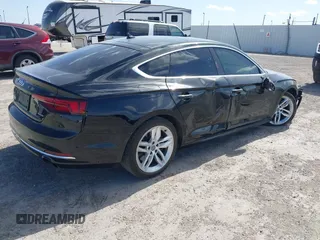 2019 Audi A5 Sportback Premium with VIN WAUANCF51KA061345, listed as a IAAI auction lot 41841741 with 84,732 mi miles. Bid and sale history available at carsss.com. Image 4.