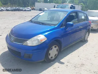 2009 Nissan Versa 1.8 SL with VIN 3N1BC13E69L479086, listed as a IAAI auction lot 42037231 with 180,076 mi miles. Bid and sale history available at carsss.com. Image 2.