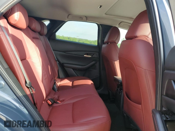 2024 Mazda CX-30 S Carbon Edition с VIN 3MVDMBCMXRM604194, выставлен на аукционе Copart как лот 54777125 с пробегом 9 816 миль миль и Списание • Salvage title. История ставок и продаж доступна на DreamBid. Изображение 11.