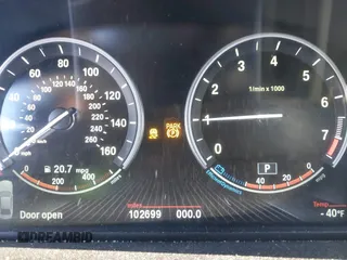 2014 BMW 7 Series 740Li xDrive with VIN WBAYF4C57ED282182, listed as a IAAI auction lot 41324877 with 102,699 mi miles. Bid and sale history available at carsss.com. Image 15.