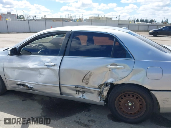 2005 Honda Accord EX z VIN 1HGCM56775A166411, wystawiony jako IAAI lot #41819230 z przebiegiem 136 431 mil mil oraz . Historia ofert i sprzedaży dostępna na DreamBid. Obrazek 17.