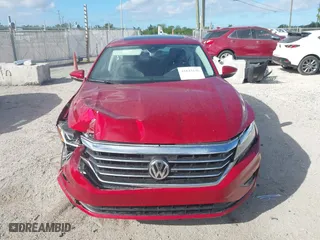 2021 Volkswagen Passat 2.0T SE with VIN 1VWSA7A30MC007748, listed as a IAAI auction lot 41843136 with 34,467 mi miles. Bid and sale history available at carsss.com. Image 6.