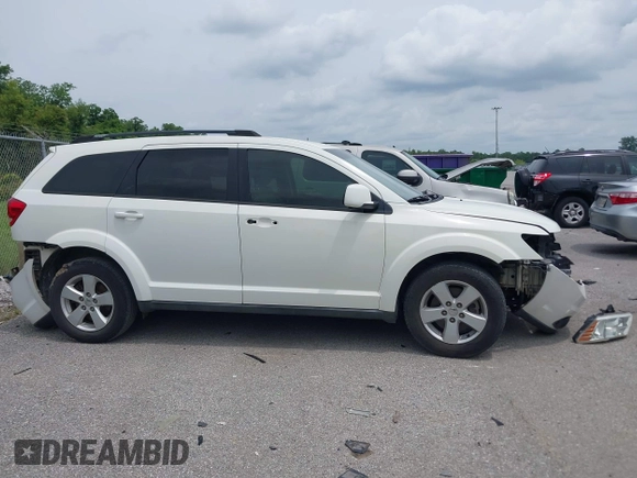 2012 Dodge Journey SXT with VIN 3C4PDCBG8CT371543, listed as a IAAI auction lot 42337728 with 174,615 mi miles and . Bid and sale history available at DreamBid. Image 13.