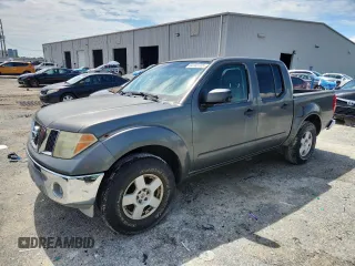 2005 Nissan Frontier LE with VIN 1N6AD07UX5C450937, listed as a Copart auction lot 64102725 with 210,701 mi miles and Clean title. Bid and sale history available at DreamBid. Image 1.