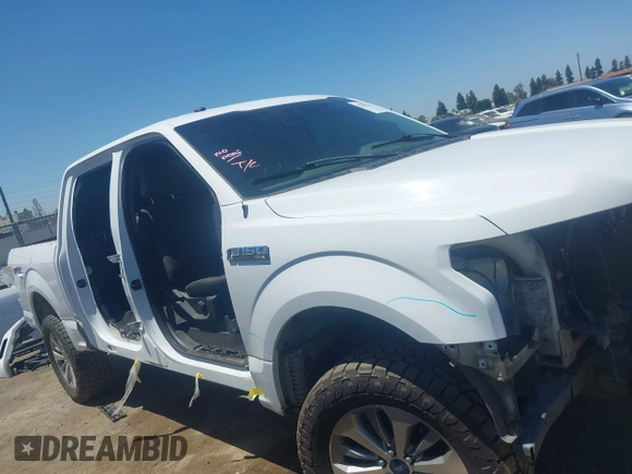 2018 Ford F-150 XL with VIN 1FTEW1EP8JKF82063, listed as a IAAI auction lot 42299414 with 153,706 mi miles and . Bid and sale history available at DreamBid. Image 14.