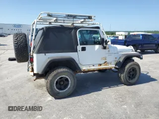 1999 Jeep Wrangler Sport with VIN 1J4FY19SXXP464096, listed as a Copart auction lot 61233105 with 167,350 mi miles and Clean title. Bid and sale history available at DreamBid. Image 3.