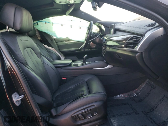 2015 BMW X6 xDrive50i with VIN 5UXKU6C52F0F93975, listed as a Copart auction lot 81944914 with 143,915 mi miles and Salvage Title. Bid and sale history available at carsss.com. Image 7.
