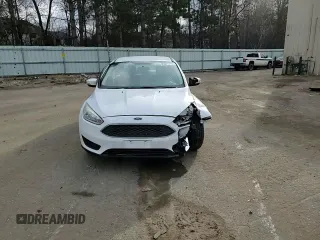 2015 Ford Focus SE z VIN 1FADP3F20FL241951, wystawiony jako Copart lot #89021775 z przebiegiem 91 698 mil mil oraz Szkoda całkowita • Salvage title. Historia ofert i sprzedaży dostępna na DreamBid. Obrazek 11.