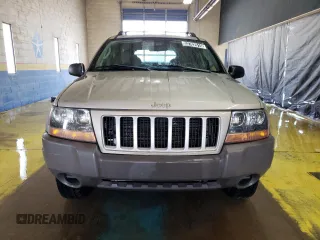 2004 Jeep Grand Cherokee Laredo z VIN 1J4GW48S24C327184, wystawiony jako Copart lot #53702515 z przebiegiem 151 411 mil mil oraz Czysty tytuł • Clean title. Historia ofert i sprzedaży dostępna na DreamBid. Obrazek 5.