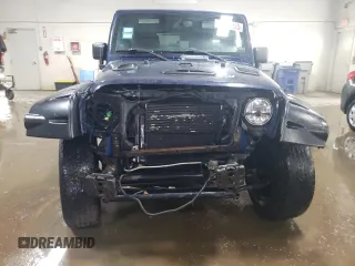 2013 Jeep Wrangler Unlimited Sport z VIN 1C4BJWDG5DL529707, wystawiony jako Copart lot #48436325 z przebiegiem 142 661 mil mil oraz Szkoda całkowita • Salvage title. Historia ofert i sprzedaży dostępna na DreamBid. Obrazek 5.