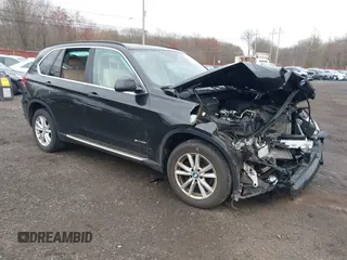 2014 BMW X5 xDrive35i z VIN 5UXKR0C51E0H26528, wystawiony jako IAAI lot #42027626 z przebiegiem 87 228 mil mil oraz . Historia ofert i sprzedaży dostępna na DreamBid. Obrazek 1.
