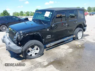 2017 Jeep Wrangler Unlimited Sport with VIN 1C4BJWDG7HL544974, listed as a IAAI auction lot 42603521 with 96,878 mi miles and . Bid and sale history available at DreamBid. Image 2.