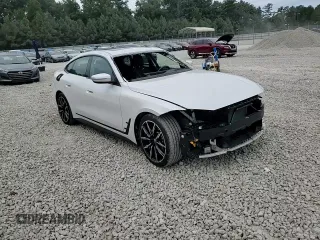 2024 BMW i4 eDrive40 z VIN WBY73AW07RFR74988, wystawiony jako Copart lot #70713824 z przebiegiem 14 117 mil mil oraz Szkody całkowita. Historia ofert i sprzedaży dostępna na DreamBid. Obrazek 12.