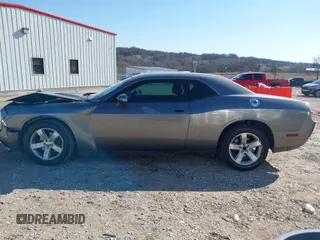 2011 Dodge Challenger z VIN 2B3CJ4DG3BH512974, wystawiony jako IAAI lot #41431931 z przebiegiem 186 845 mil mil oraz . Historia ofert i sprzedaży dostępna na DreamBid. Obrazek 14.