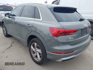 2020 Audi Q3 Premium z VIN WA1AECF32L1061271, wystawiony jako IAAI lot #42038795 z przebiegiem 23 902 mil mil oraz . Historia ofert i sprzedaży dostępna na DreamBid. Obrazek 3.