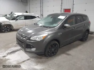 2013 Ford Escape SEL with VIN 1FMCU9H96DUC78548, listed as a IAAI auction lot 41217934 with 213,859 mi miles. Bid and sale history available at carsss.com. Image 16.