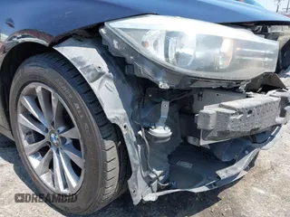 2014 BMW 3 Series 328i Gran Turismo xDrive z VIN WBA3X5C50ED557470, wystawiony jako IAAI lot #42606682 z przebiegiem 172 016 mil mil oraz . Historia ofert i sprzedaży dostępna na DreamBid. Obrazek 21.