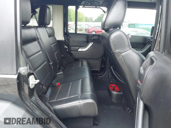 2012 Jeep Wrangler Unlimited Sahara with VIN 1C4HJWEG0CL168300, listed as a IAAI auction lot 42430678 with 70,000 mi miles and . Bid and sale history available at DreamBid. Image 8.