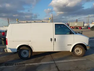 1998 Chevrolet Astro Cargo Van with VIN 1GCDM19W4WB133439, listed as a IAAI auction lot 41456062 with 310,476 mi miles. Bid and sale history available at carsss.com. Image 13.