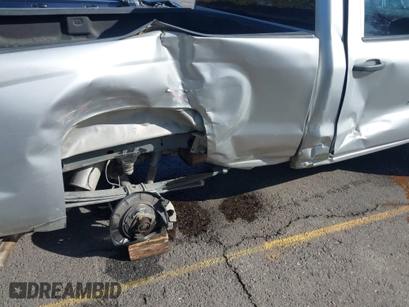 2014 Chevrolet Silverado 1500 with VIN 1GCNCREH2EZ303297, listed as a IAAI auction lot 41692877 with 115,621 mi miles and . Bid and sale history available at DreamBid. Image 6.