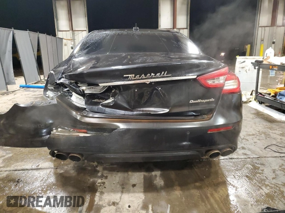 2017 Maserati Quattroporte z VIN ZAM56RRL4H1217395, wystawiony jako Copart lot #83762004 z przebiegiem 41 409 mil mil oraz Szkoda całkowita • Salvage title. Historia ofert i sprzedaży dostępna na DreamBid. Obrazek 6.