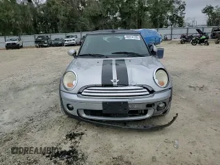 2009 MINI Convertible с VIN WMWMR33579TU95581, выставлен на аукционе Copart как лот 45914735 с пробегом 129 790 миль миль и Списание • Salvage title. История ставок и продаж доступна на DreamBid. Изображение 11.