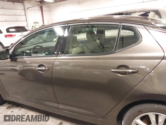 2013 Kia Optima EX with VIN 5XXGN4A72DG120129, listed as a IAAI auction lot 41858461 with 138,627 mi miles. Bid and sale history available at carsss.com. Image 14.