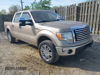 2012 Ford F-150 XL with VIN 1FTFW1ET1CFA03279, listed as a IAAI auction lot 42107076 with 160,972 mi miles. Bid and sale history available at carsss.com. Image 1.