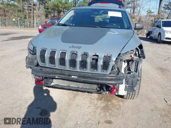 2014 Jeep Cherokee Trailhawk with VIN 1C4PJMBS4EW179763, listed as a IAAI auction lot 41988048 with 152,681 mi miles. Bid and sale history available at carsss.com. Image 6.
