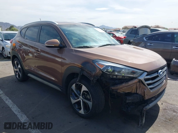 2017 Hyundai Tucson Value z VIN KM8J33A21HU495872, wystawiony jako IAAI lot #42235210 z przebiegiem 158 185 mil mil oraz . Historia ofert i sprzedaży dostępna na DreamBid. Obrazek 6.