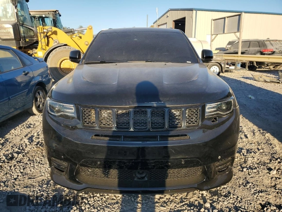 2017 Jeep Grand Cherokee SRT with VIN 1C4RJFDJ6HC828848, listed as a Copart auction lot 75535903 with 106,870 mi miles and Salvage Title. Bid and sale history available at carsss.com. Image 5.