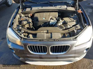 2014 BMW X1 sDrive28i with VIN WBAVM1C52EVW55890, listed as a IAAI auction lot 41512784 with 97,718 mi miles. Bid and sale history available at carsss.com. Image 10.