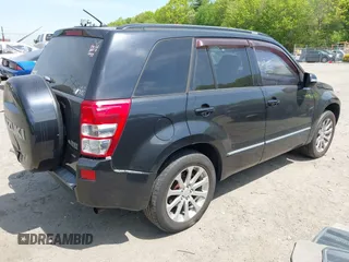 2013 Suzuki Grand Vitara Limited z VIN JS3TD0D7XD4100356, wystawiony jako IAAI lot #42250142 z przebiegiem 124 912 mil mil oraz . Historia ofert i sprzedaży dostępna na DreamBid. Obrazek 4.