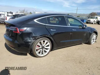 2019 Tesla Model 3 Mid Range with VIN 5YJ3E1EAXKF311719, listed as a Copart auction lot 44570825 with 143,034 mi miles and Salvage Title. Bid and sale history available at carsss.com. Image 3.