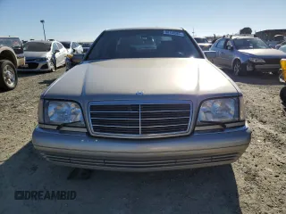 1996 Mercedes-Benz S with VIN WDBGA43E9TA311921, listed as a Copart auction lot 88758965 with 141,035 mi miles and Salvage Title. Bid and sale history available at DreamBid. Image 5.